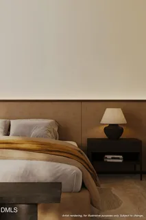 a bedroom with a bed and a night stand