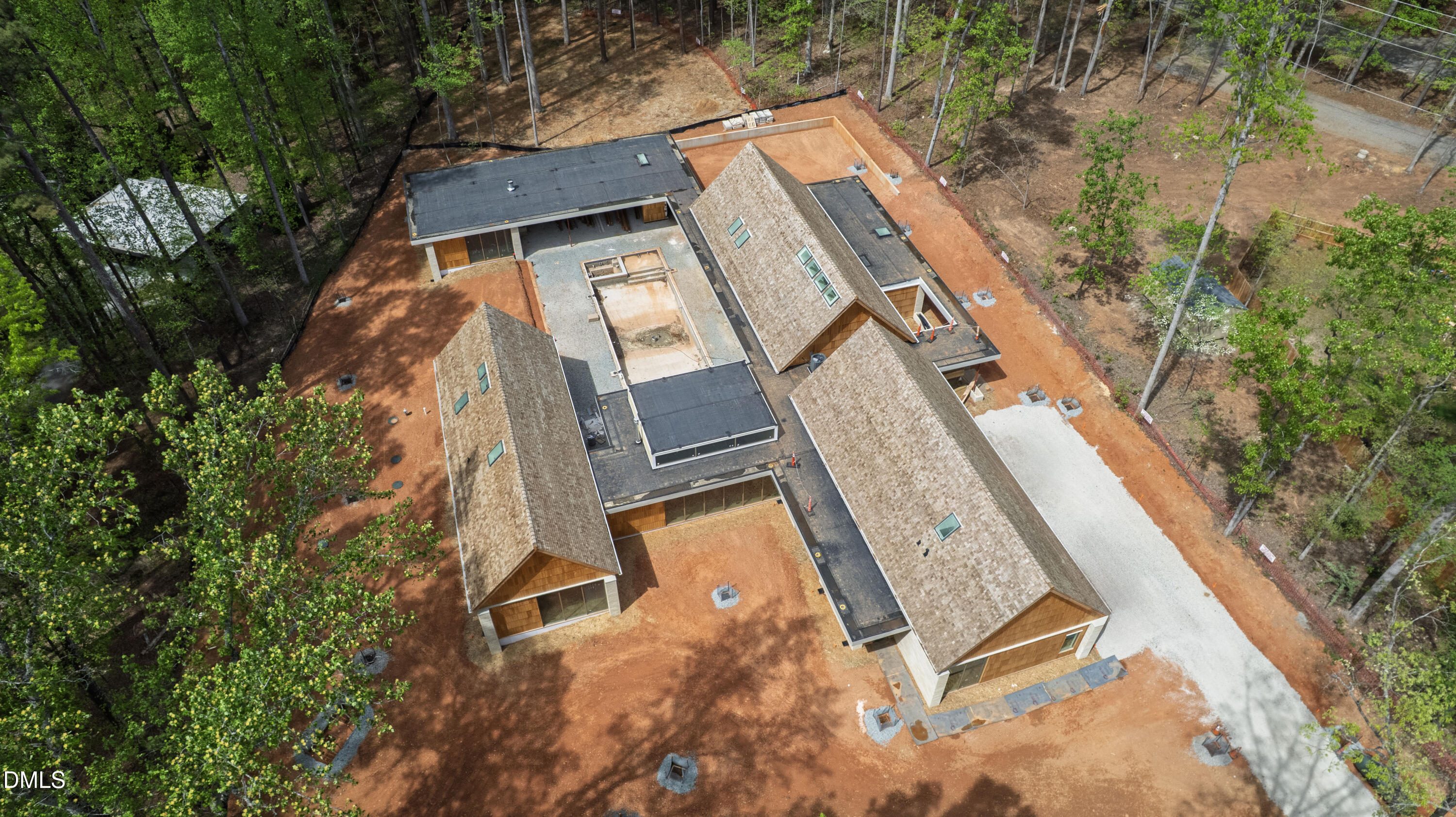 6004 Canadero Drive Raleigh, NC 27612 - Photo 34 of 36 an aerial view of a house with a yard