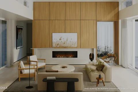 a living room with furniture and a painting on the wall