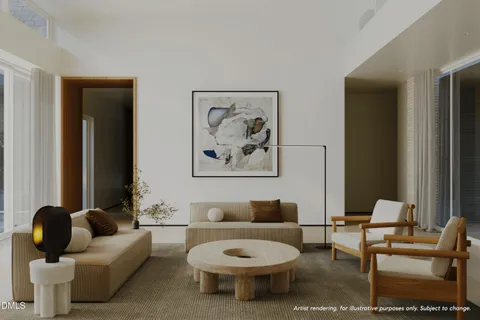 a living room with furniture a couch and a window