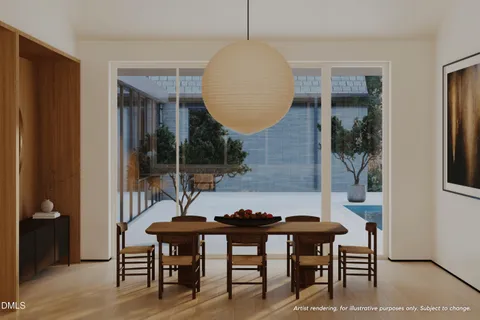 a view of a dining room with furniture and window