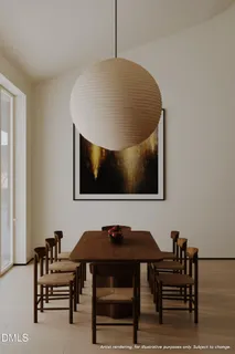 a living room with a couch and chairs