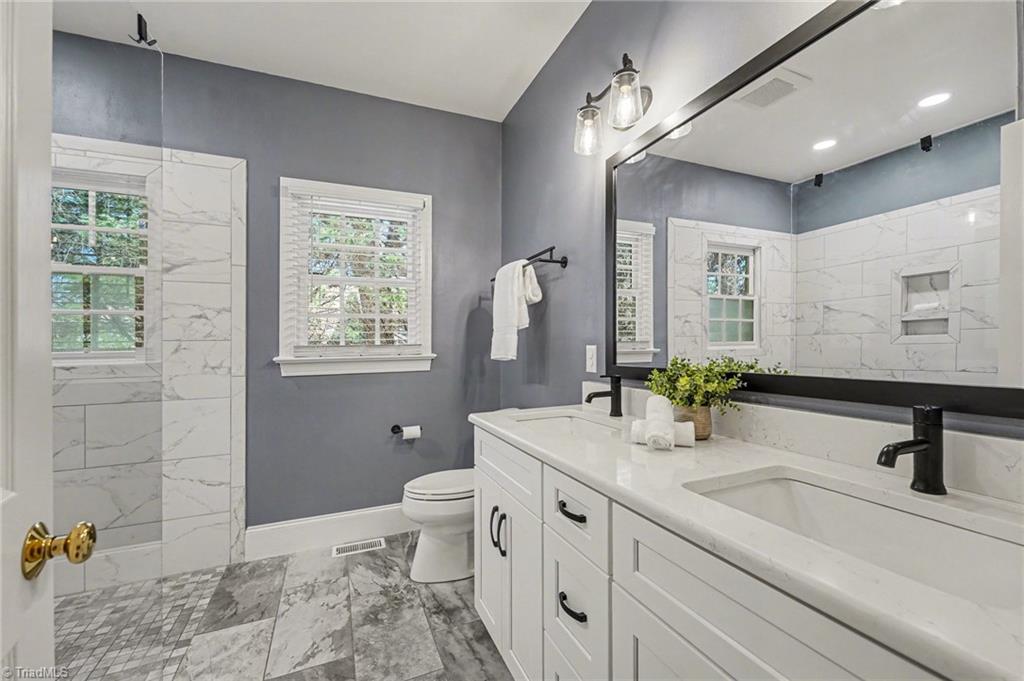 4257 Wayne Road Greensboro, NC 27407 - Photo 22 of 45 Hall Bathroom with Zero Entry Shower