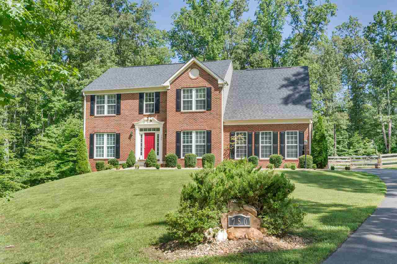 750 Reedy Creek Road Louisa, VA 23093 - Photo 1 of 41 a front view of a house with a yard