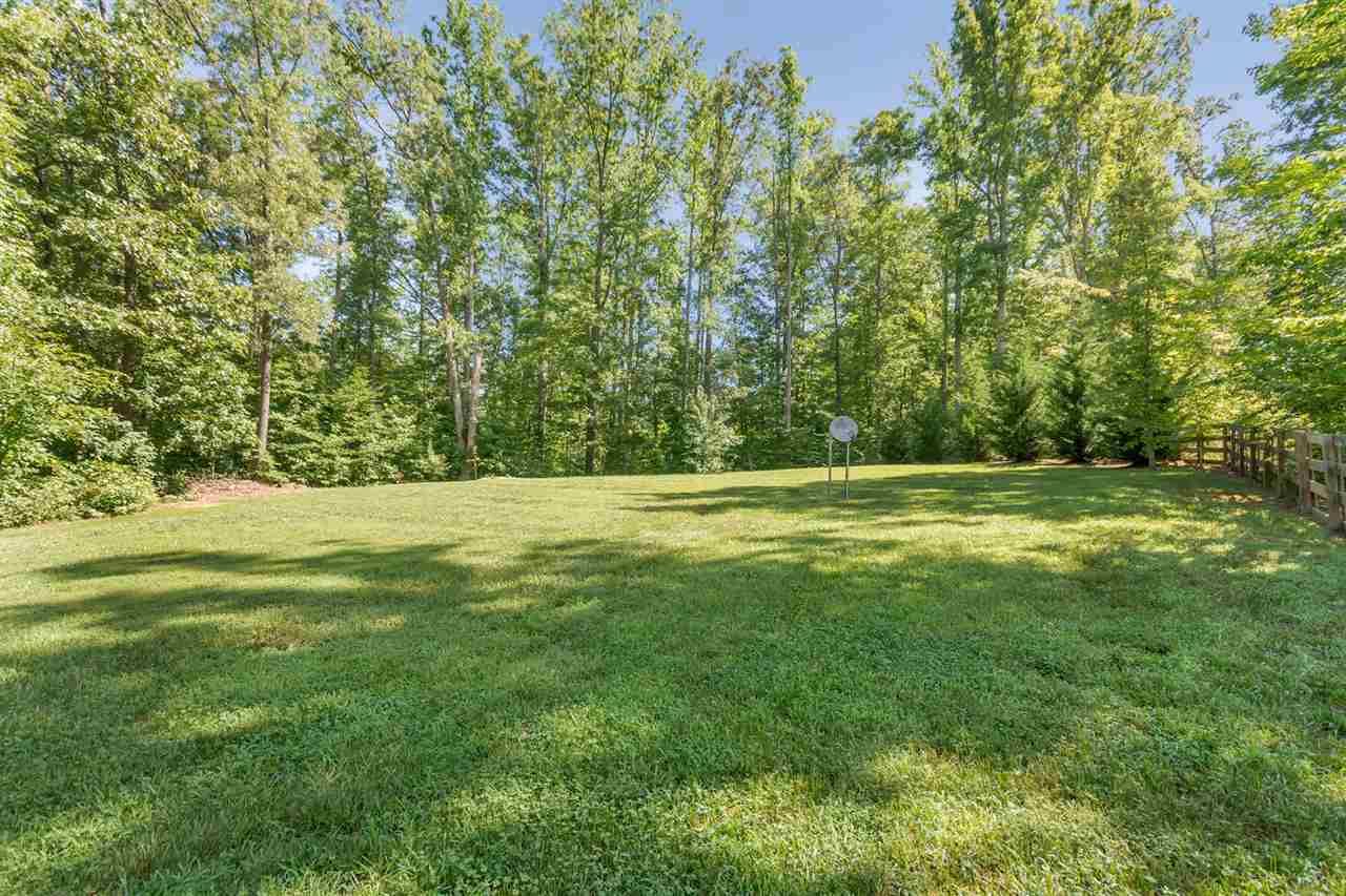 750 Reedy Creek Road Louisa, VA 23093 - Photo 39 of 41 a view of outdoor space with trees all around
