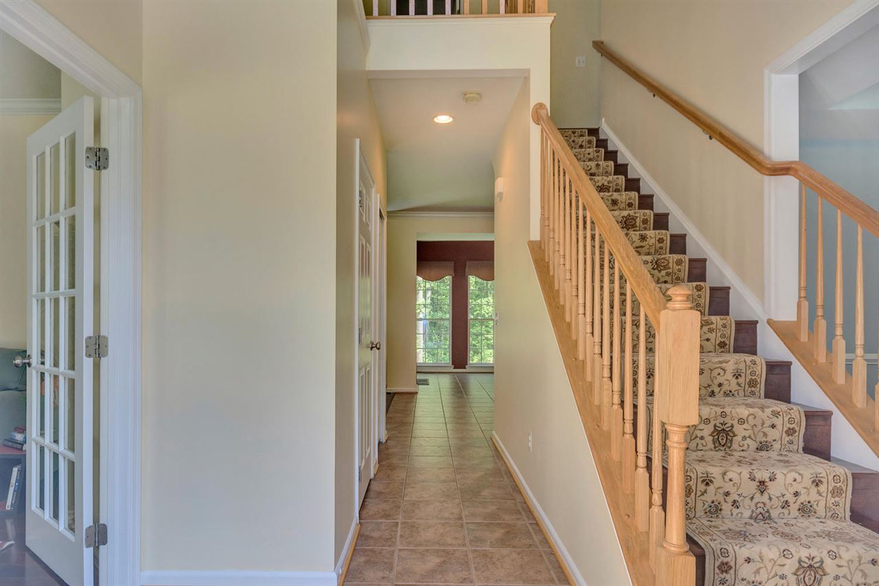 750 Reedy Creek Road Louisa, VA 23093 - Photo 8 of 41 a view of a hallway with wooden floor and entryway