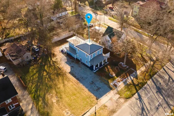 front view of a house with a street