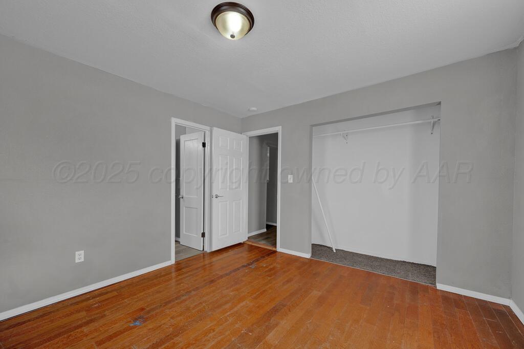 4006 Southeast 13th Avenue Amarillo, TX 79104 - Photo 13 of 16 a view of empty room with wooden floor