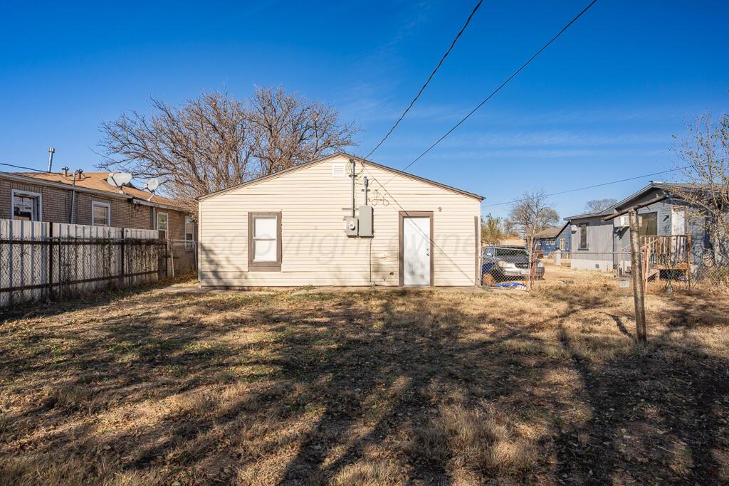 4006 Southeast 13th Avenue Amarillo, TX 79104 - Photo 15 of 16 a view of a house with a backyard