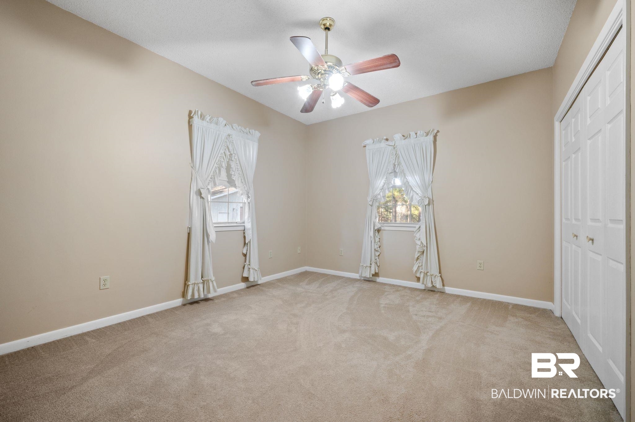15801 Maytower Road Bay Minette, AL 36507 - Photo 23 of 43 Unfurnished bedroom featuring light carpet, a closet, and ceiling fan