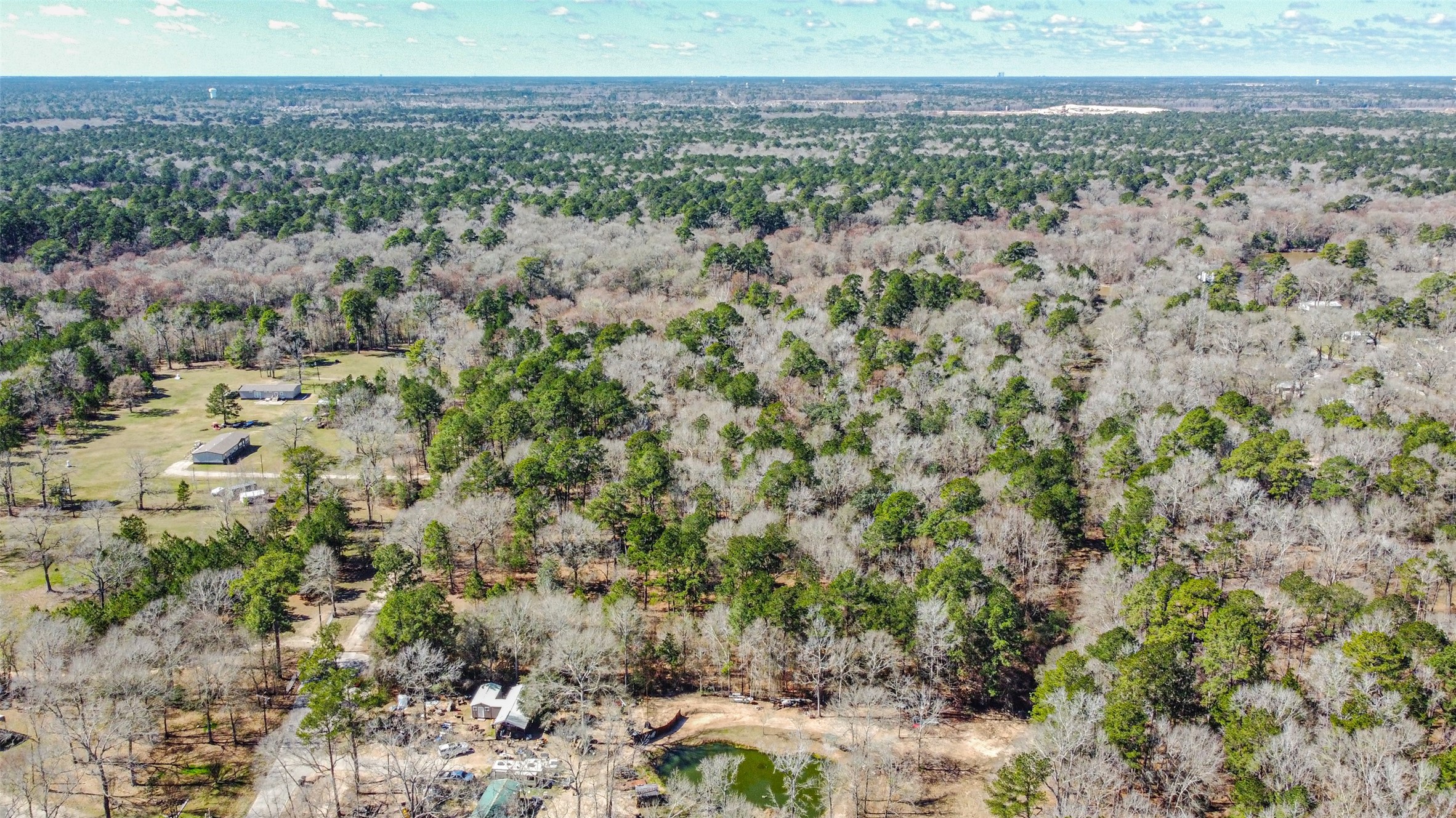 0 Holder Rambo Drive Huffman, TX 77336 - Photo 3 of 12 a view of a city with green field