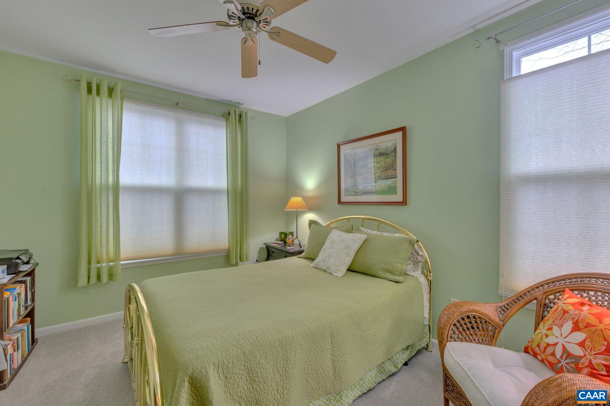 765 Walker Square, Unit 2D Charlottesville, VA 22903 - Photo 18 of 33 a bedroom with a bed and window