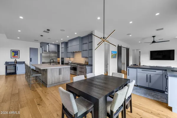 a bed room with a bed and a large mirror