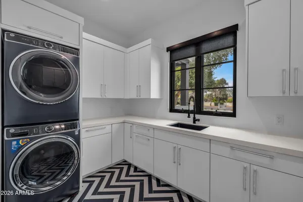 a kitchen with a stove and a refrigerator