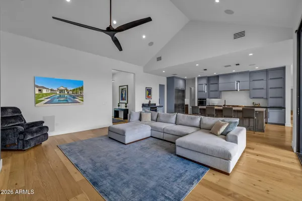 a view of a swimming pool with an outdoor seating