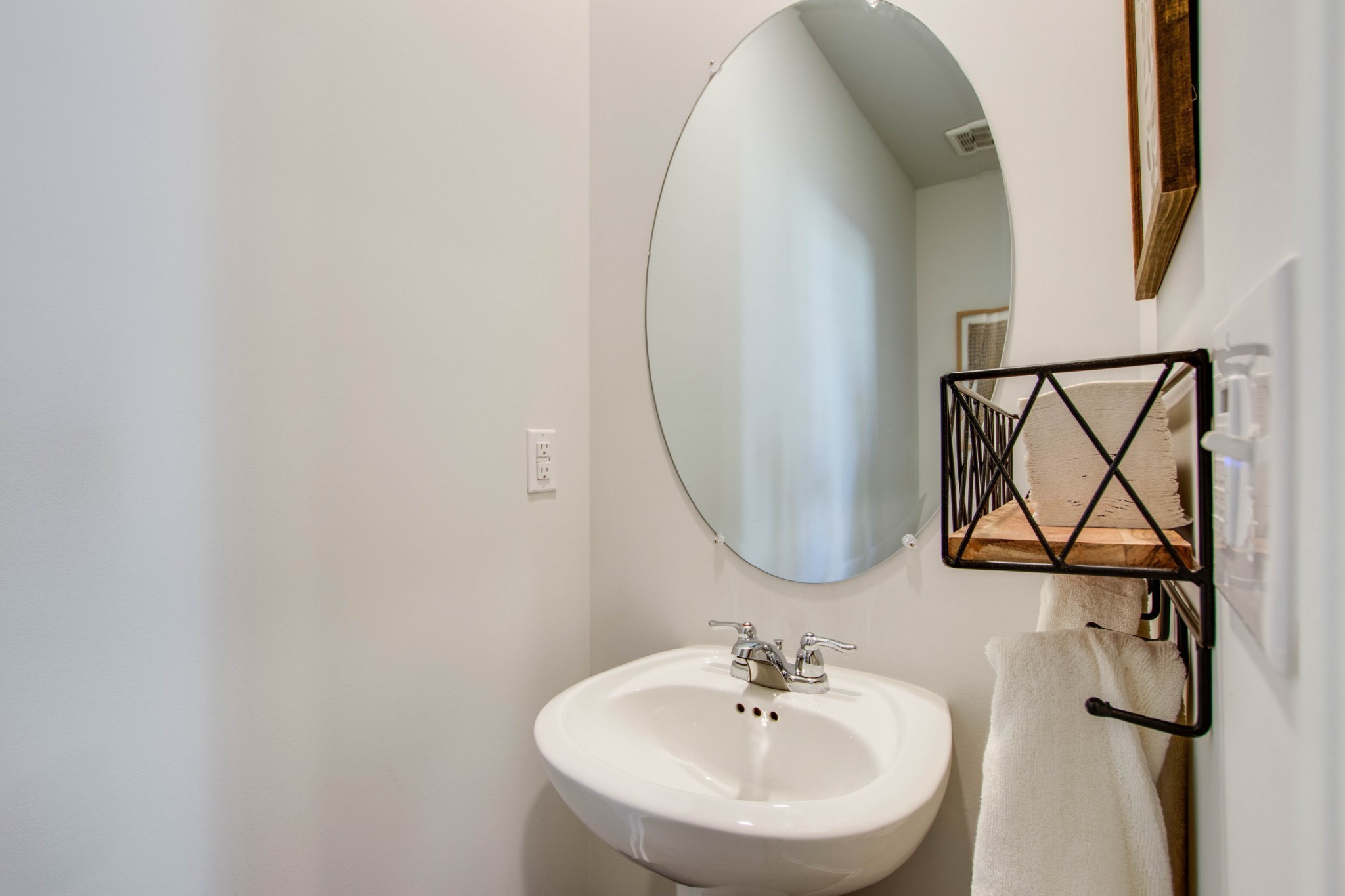 153 Mackenzie Way Lewisburg, TN 37091 - Photo 12 of 53 a bathroom with a sink and mirror