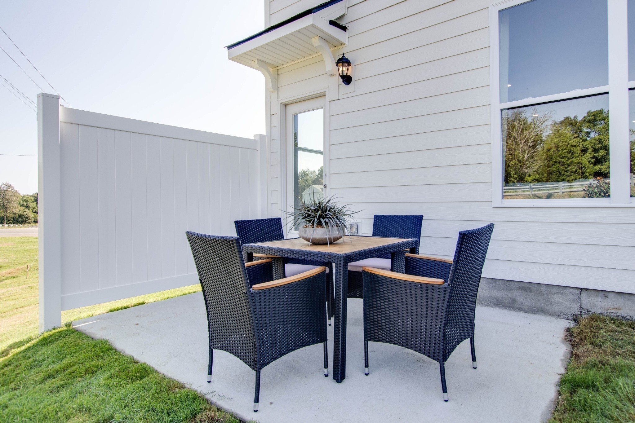 153 Mackenzie Way Lewisburg, TN 37091 - Photo 22 of 53 a view of a dining table and chairs in the patio