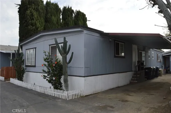 a view of a house with a garage