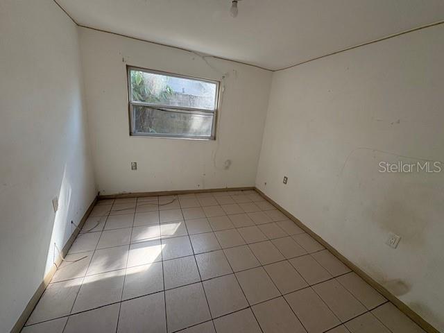 1672 10th Street Sarasota, FL 34236 - Photo 15 of 24 a view of an empty room with a window