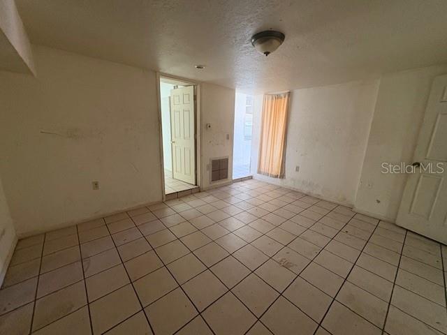 1672 10th Street Sarasota, FL 34236 - Photo 20 of 24 a view of an empty room and window