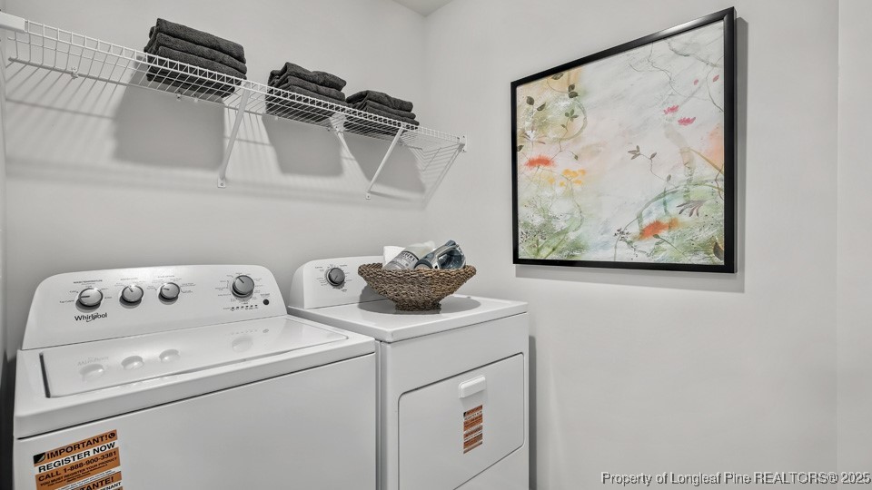 45 Mercer Way Spring Lake, NC 28390 - Photo 31 of 35 a utility room with dryer and washer