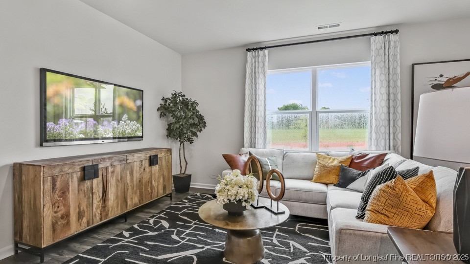45 Mercer Way Spring Lake, NC 28390 - Photo 7 of 35 a living room with furniture and a window