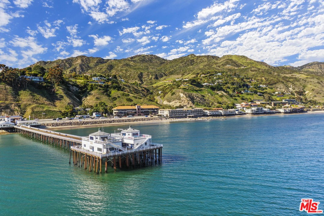 22630 Pacific Coast Highway Malibu, CA 90265 - Photo 22 of 24 a view of a lake with a mountain