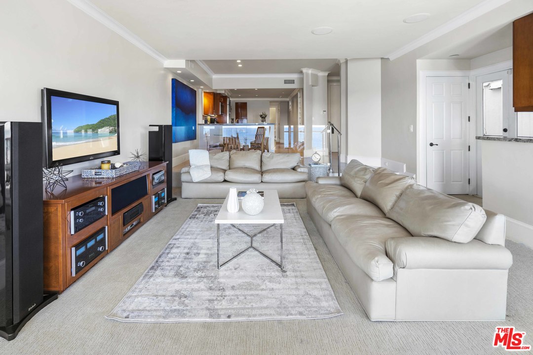 22630 Pacific Coast Highway Malibu, CA 90265 - Photo 4 of 24 a living room with furniture and a flat screen tv
