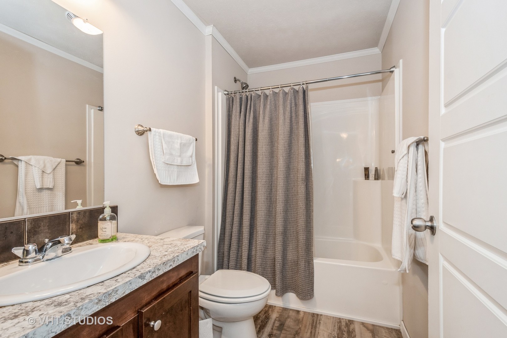 304 3rd Street Northfield, IL 60093 - Photo 12 of 14 a living room with furniture and a flat screen tv