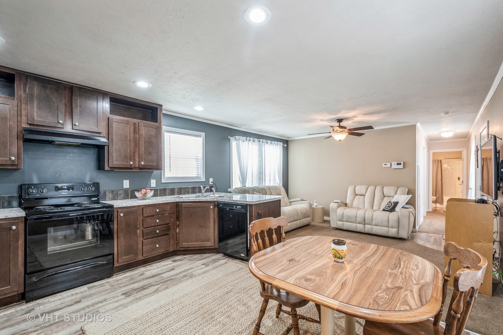 304 3rd Street Northfield, IL 60093 - Photo 5 of 14 a kitchen with granite countertop a refrigerator stove and sink