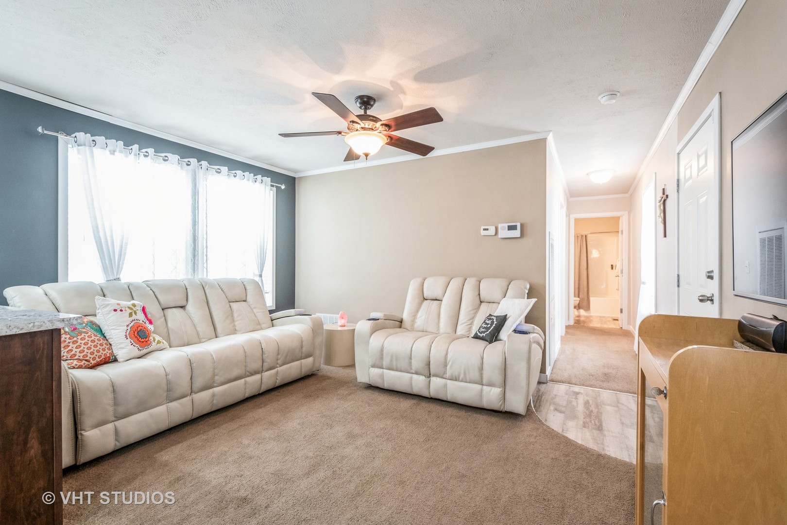 304 3rd Street Northfield, IL 60093 - Photo 7 of 14 a living room with furniture and a large window