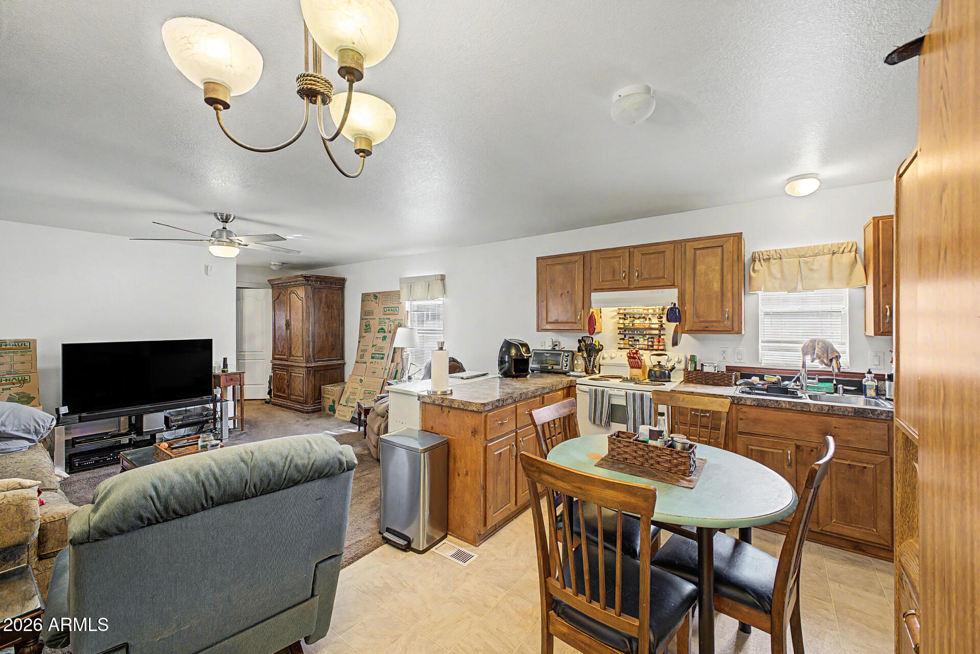625 West McKellips Road, Unit 55 Mesa, AZ 85201 - Photo 7 of 21 a view of a dining room with furniture