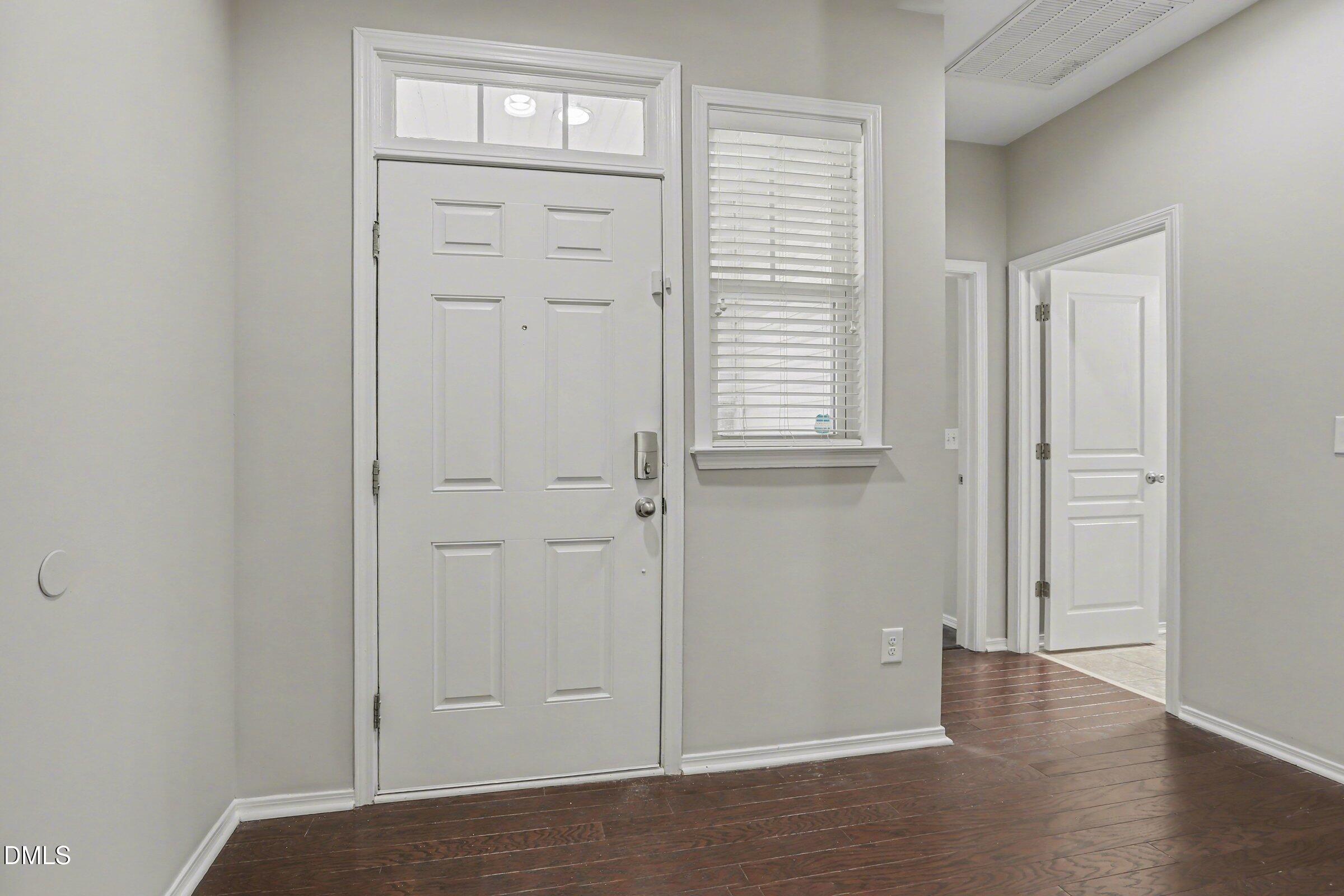 132 Daneborg Road Durham, NC 27703 - Photo 16 of 37 an empty room with windows and closet