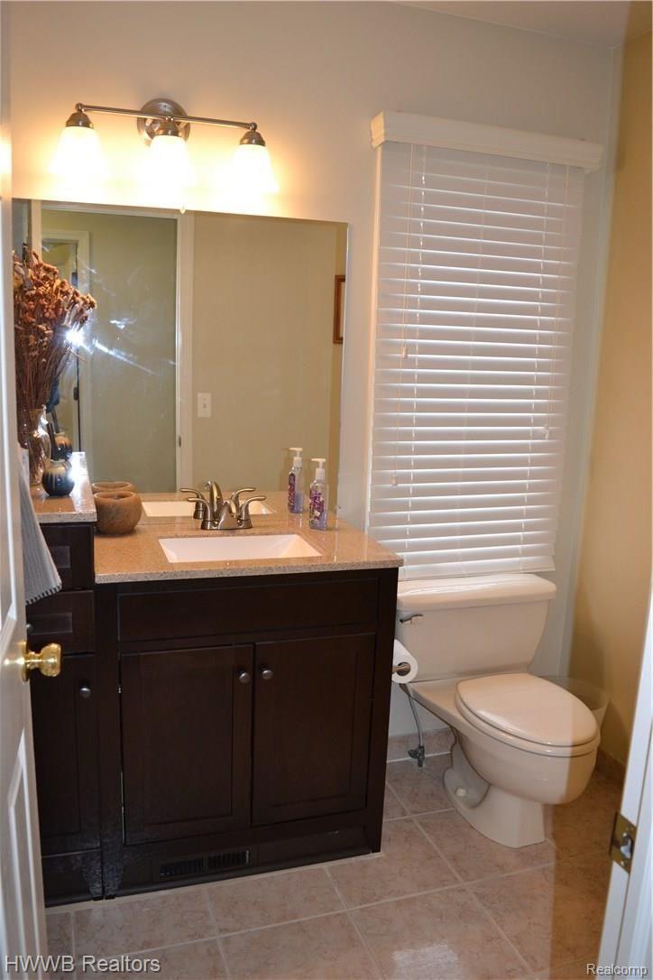 1205 Creek View Drive Rochester, MI 48307 - Photo 17 of 40 back door powder room