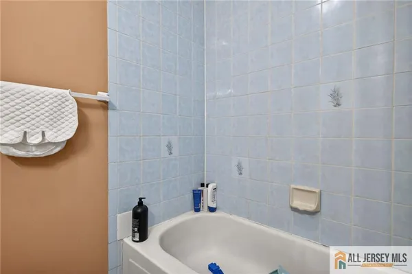 a bathroom with a sink and a tub