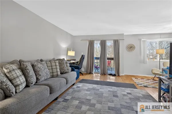 a living room with furniture and window
