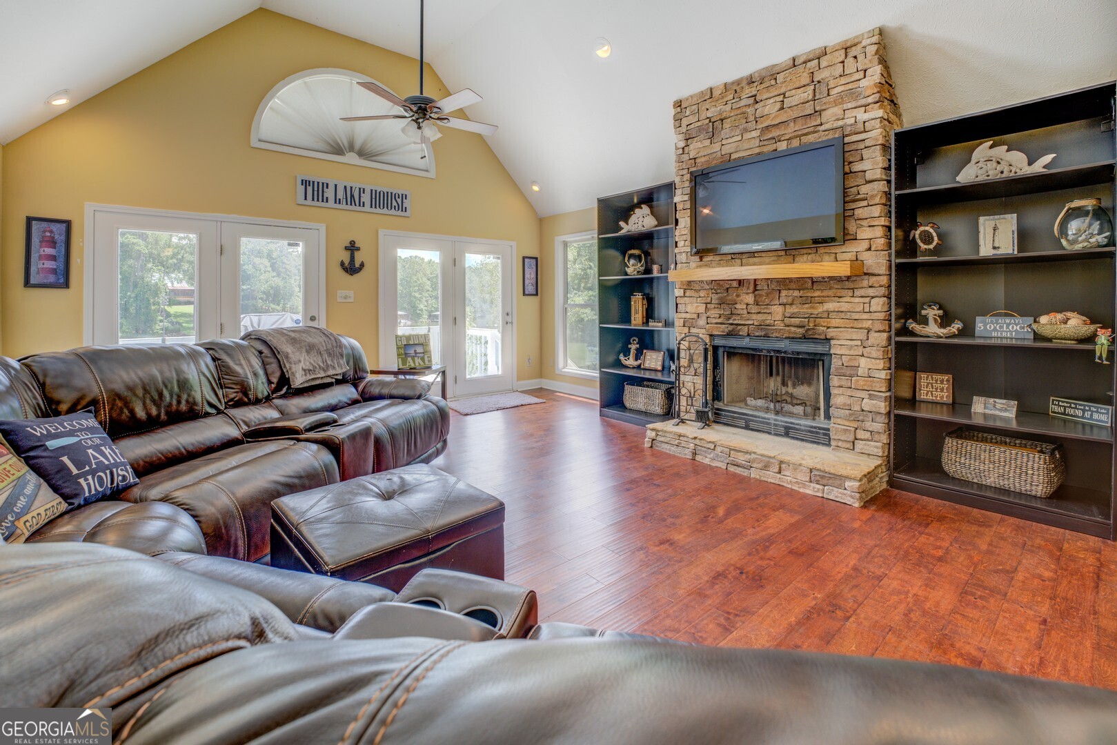 129 Old Kersey Road Jackson, GA 30233 - Photo 13 of 47 a living room with furniture flat screen tv and a fireplace