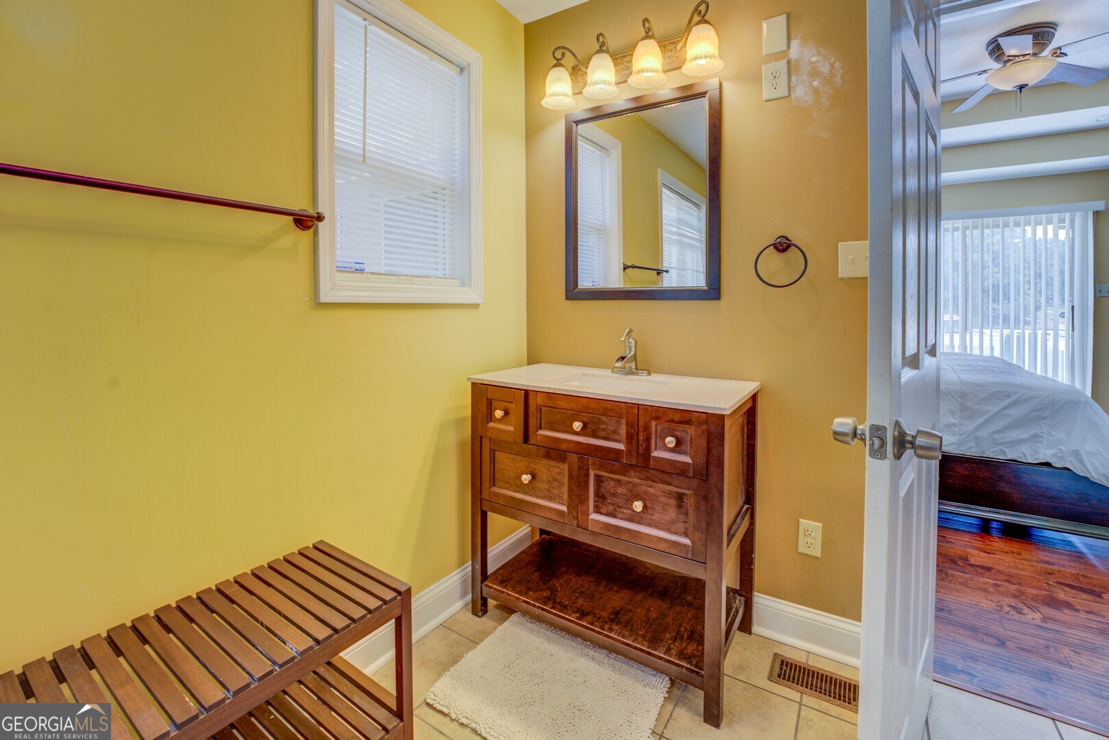 129 Old Kersey Road Jackson, GA 30233 - Photo 21 of 47 a bathroom with a sink and a mirror