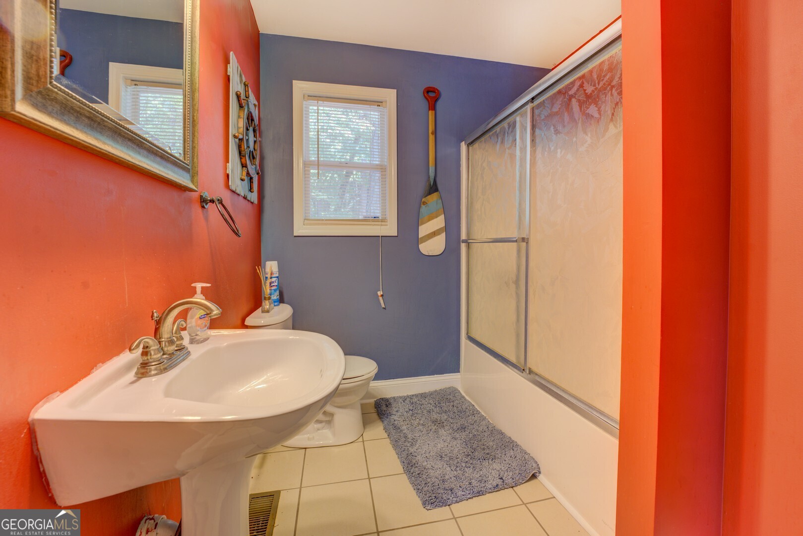 129 Old Kersey Road Jackson, GA 30233 - Photo 26 of 47 a bathroom with a sink and mirror