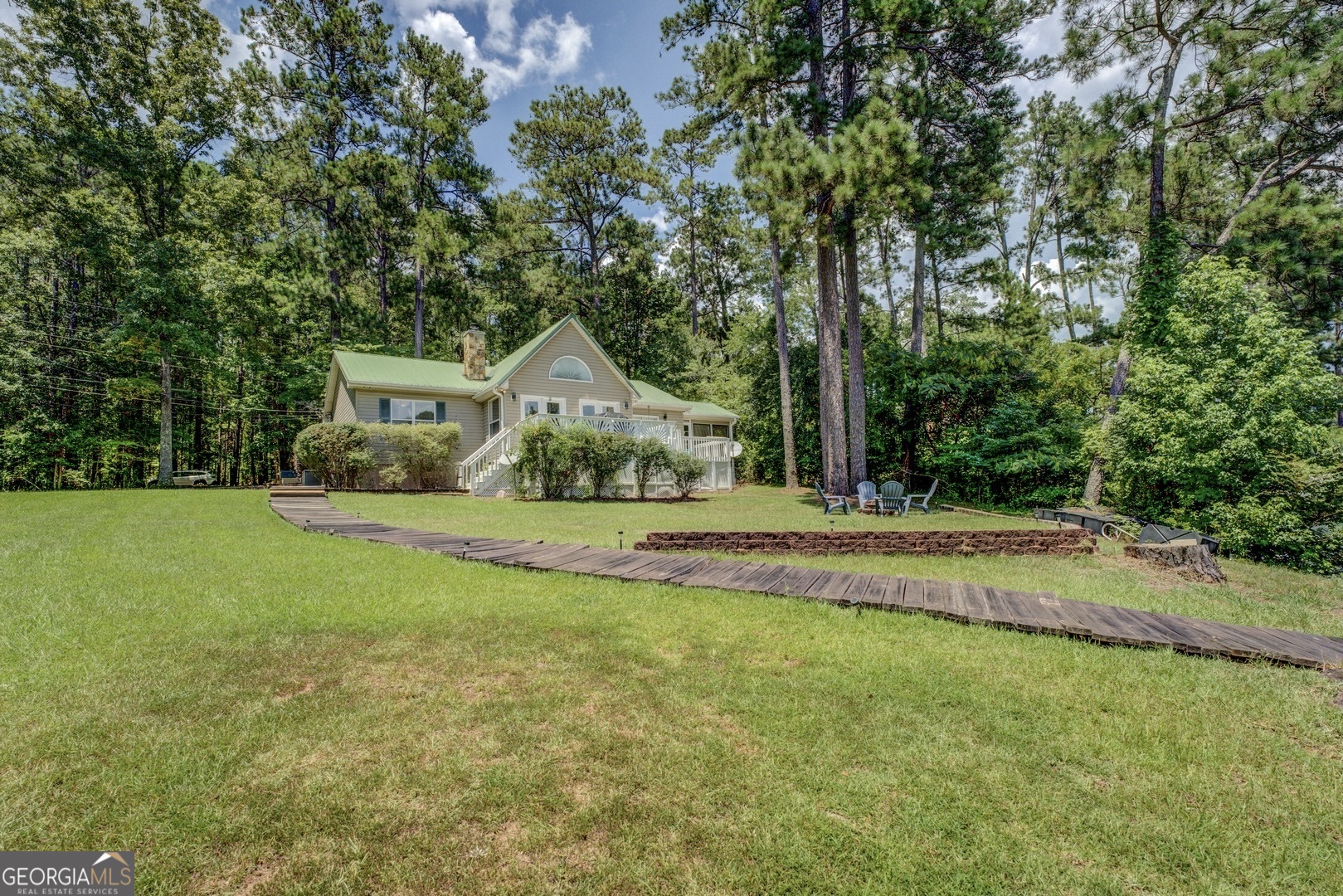 129 Old Kersey Road Jackson, GA 30233 - Photo 34 of 47 a view of a house with backyard and trees
