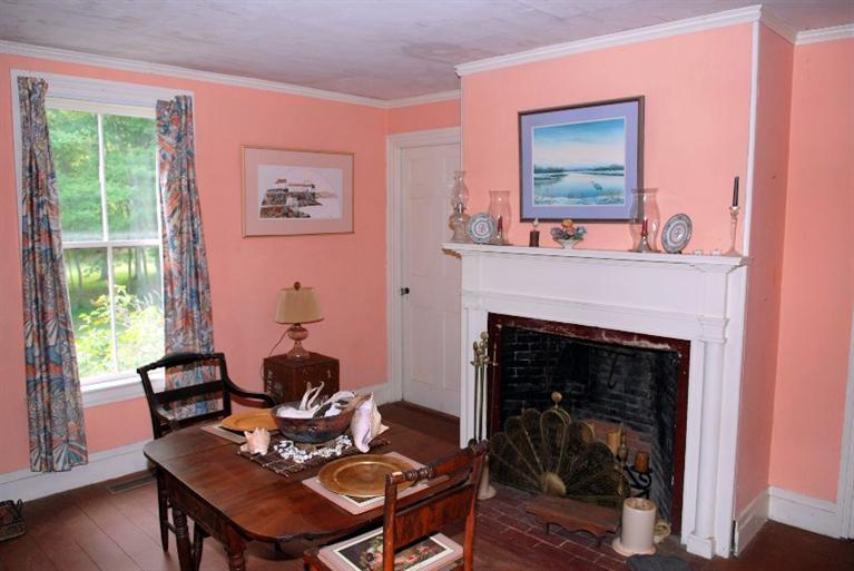 1276 County Road Cataumet, MA 02534 - Photo 8 of 15 a living room with furniture and a fireplace