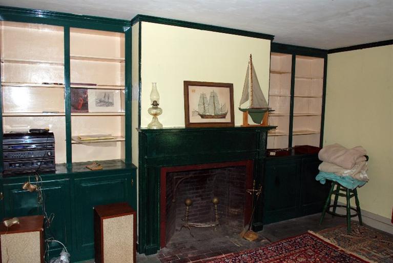 1276 County Road Cataumet, MA 02534 - Photo 9 of 15 a living room with furniture a window and a fireplace
