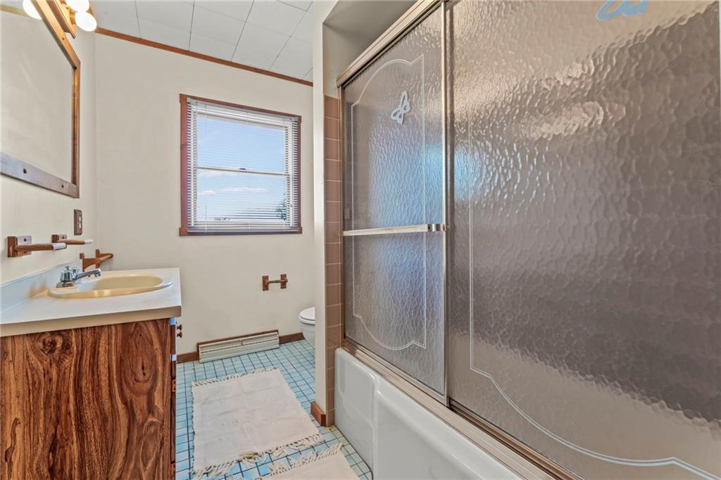 106 Donora Road Monongahela, PA 15063 - Photo 19 of 33 Upstairs Bathroom Offers A Tub/Shower Combo, Large Window And Large Vanity with Overhead Mirror And Lighting.