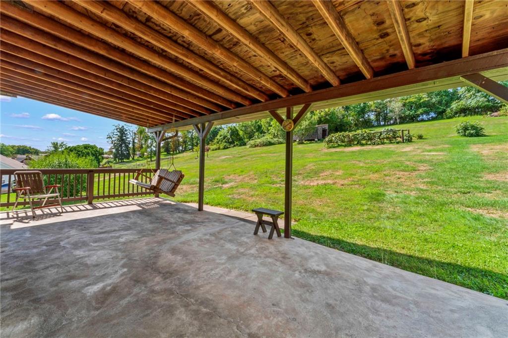 106 Donora Road Monongahela, PA 15063 - Photo 22 of 33 Whether You're Looking To Cultivate A Garden, Create An Outdoor Entertainment Area, Or Simply Relax In A Serene Setting, This Backyard Offers Endless Possibilities!