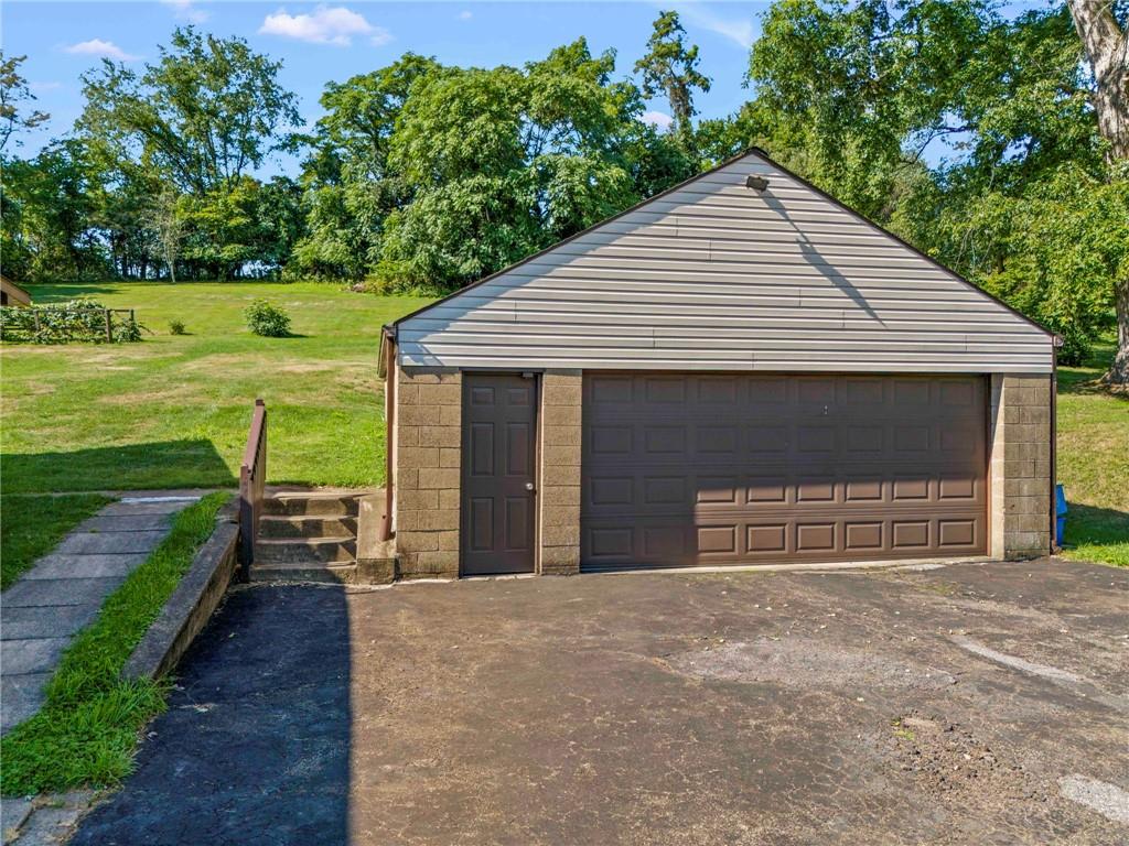 106 Donora Road Monongahela, PA 15063 - Photo 24 of 33 Large 2 Car Garage Offers Additional Storage Or Workspace