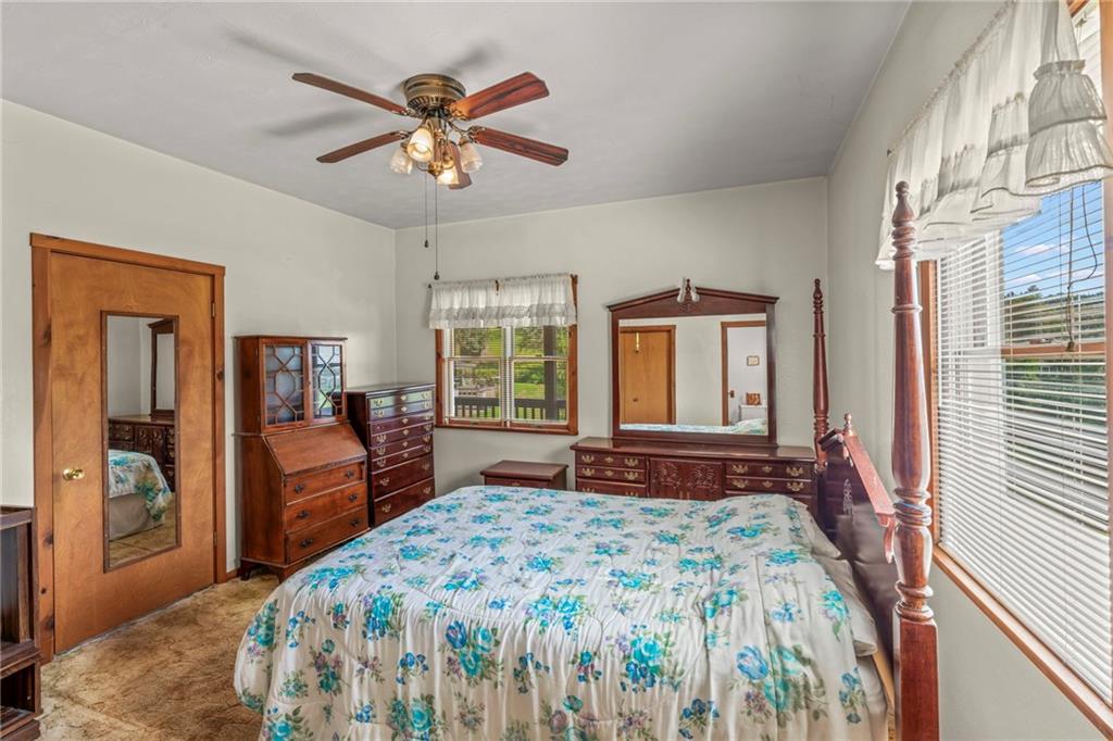106 Donora Road Monongahela, PA 15063 - Photo 6 of 33 First Floor Master Bedroom Measures 13X12. 2 Large Windows Offer Lovely Views And A Bright, Airy Atmosphere