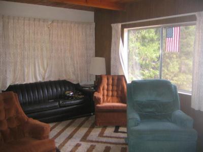 0 South Derrick Flat Road Trinity Center, CA 96091 - Photo 4 of 5 a living room with furniture and a large window