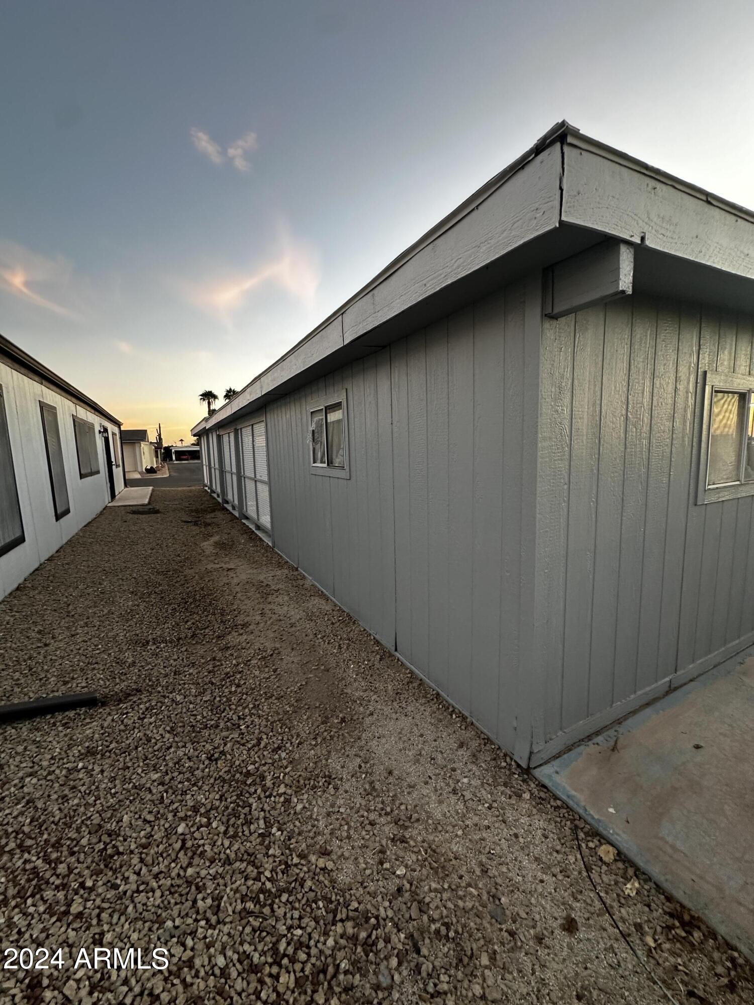 3500 South Tomahawk Road, Unit 110 Apache Junction, AZ 85119 - Photo 11 of 59 East Side of Home