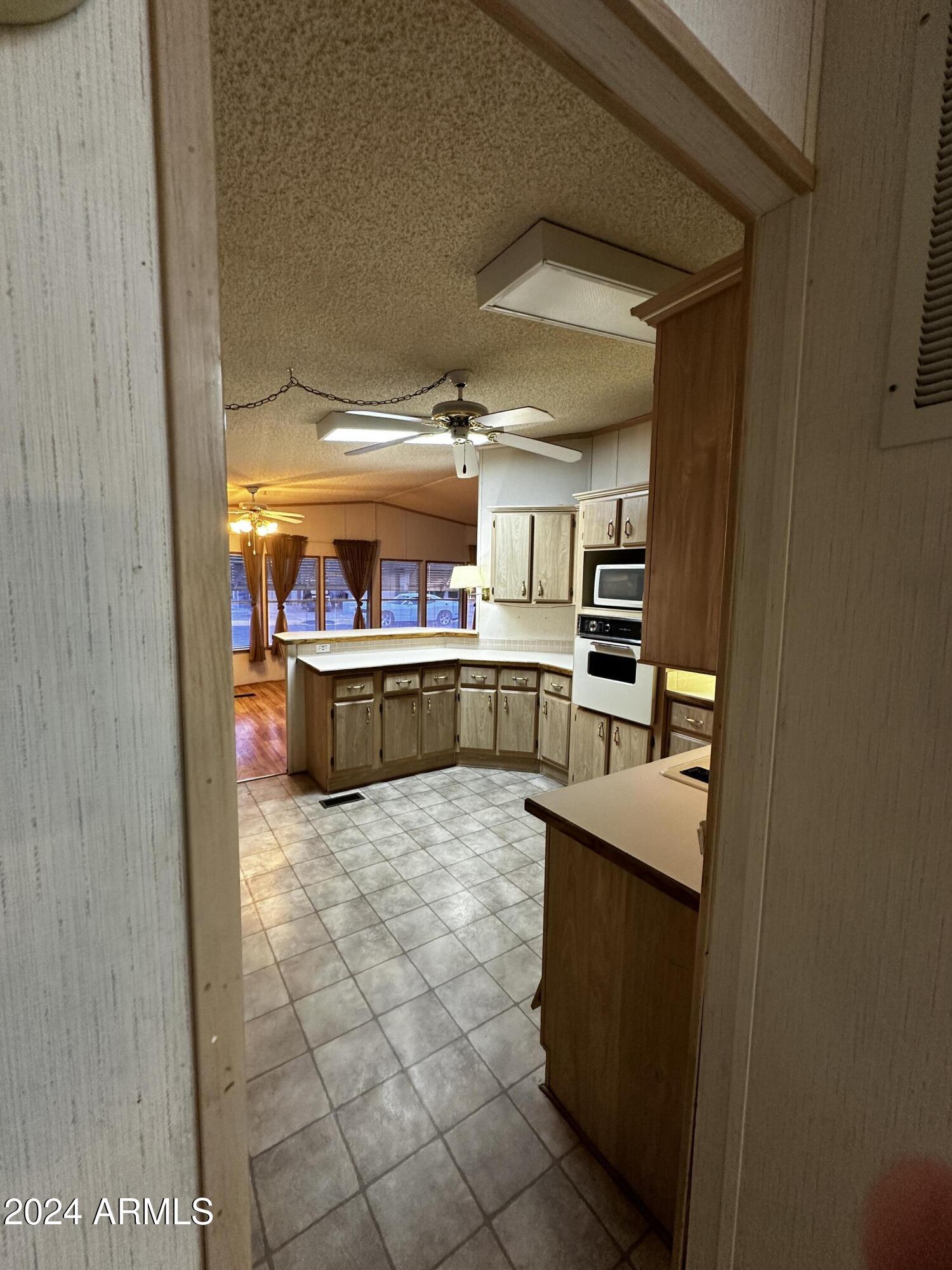 3500 South Tomahawk Road, Unit 110 Apache Junction, AZ 85119 - Photo 26 of 59 Kitchen