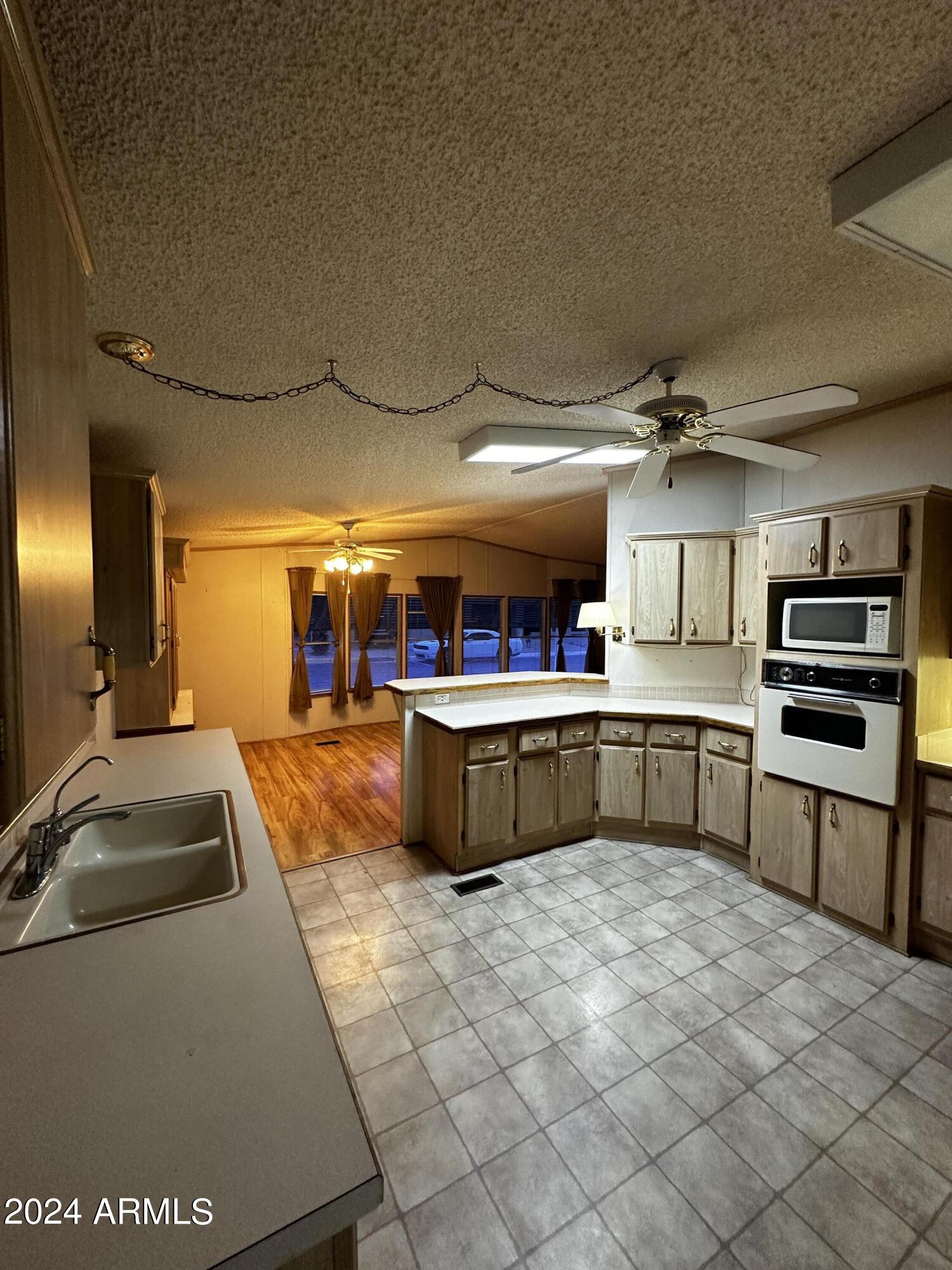 3500 South Tomahawk Road, Unit 110 Apache Junction, AZ 85119 - Photo 27 of 59 Kitchen